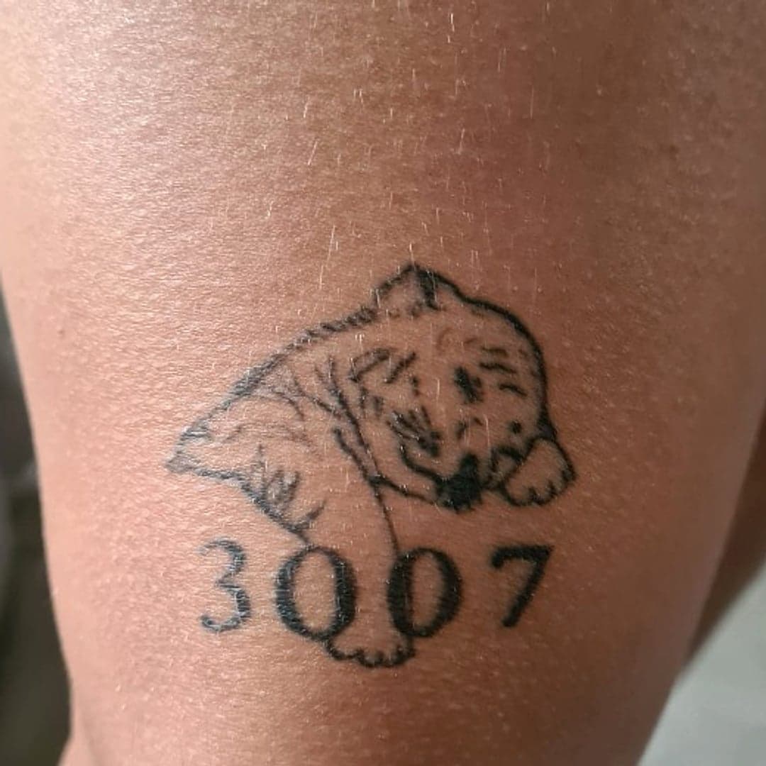 Tatouage tigreceau et date 3007